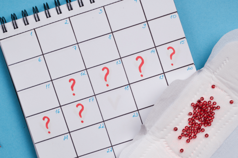 question marks on a calendar indicating irregular periods