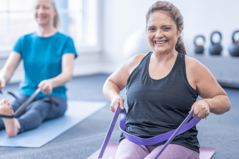 Mature woman exercises with a resistance band