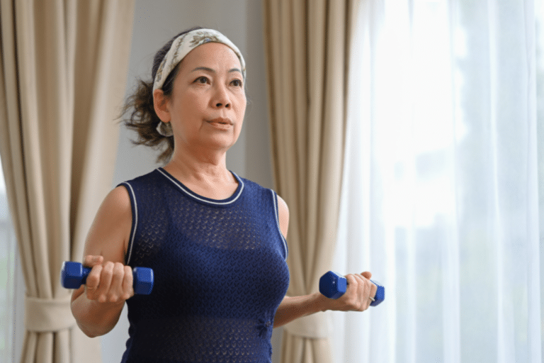 strong confident woman lifting weights in her home